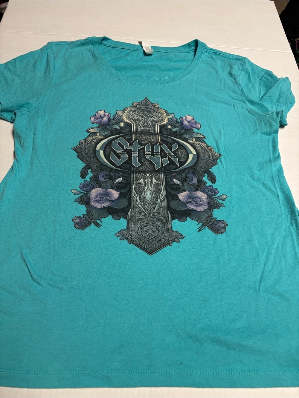 Next Level Styx Band Turquoise Short Sleeve Graphic Tee with Floral Crest